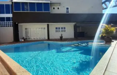 Casa residencial de alto padrão com 4 suítes para alugar no bairro tucanos