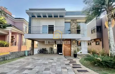 Casa em condomínio fechado com 3 quartos à venda na avenida alphaville, 2745, alphaville, gravataí por r$ 2.390.000