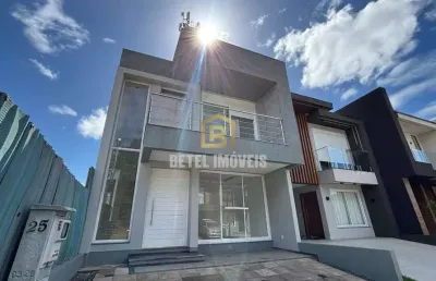 Casa em condomínio fechado com 4 quartos à venda na rua tancredo neves, 990, jansen, gravataí por r$ 795.000