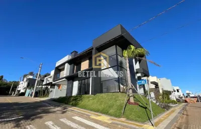 Casa em condomínio fechado com 3 quartos à venda na rua tancredo neves, 990, jansen, gravataí por r$ 1.390.000