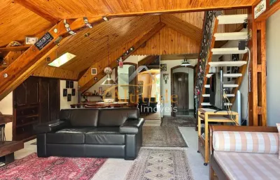 Loft clássico com ambiente amplo e integração com a natureza