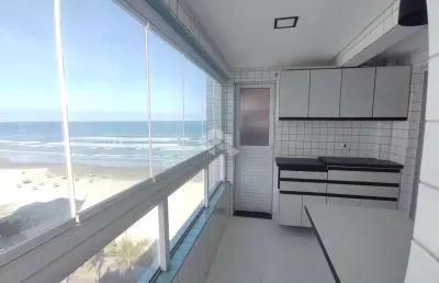 Apartamento a venda na praia grande, no bairro real, com 2 quartos 1 suite e 1 vaga.