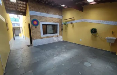 Sobrado geminado a venda na praia grande, bairro maracanã, 2 suites e 2 vagas vista mar