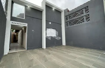 Casa nova a venda na praia grande, no bairro caiçara, com 2 quartos, 2 suítes e 2 vagas