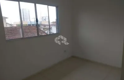 Casa de condominio na praia grande, bairro solemar, com 2 quartos e 1 vaga