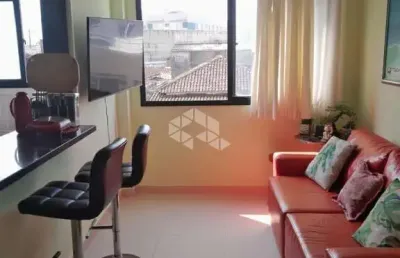Apartamento a venda na praia grande, no solemar com 1 quarto e 1 vaga