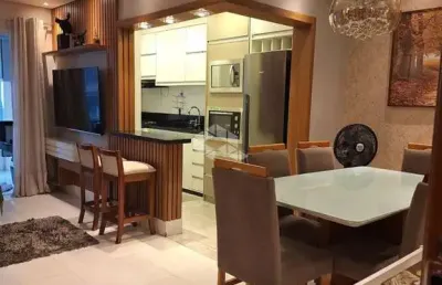 Apartamento a venda na praia grande, no bairro real, com 2 quartos 1 suite e 1 vaga.