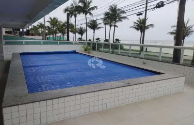 Apartamento a vista na praia grande, bairro real, com 2 quartos 1 suite e uma vaga