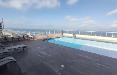 Apartamento a venda na praia grande, bairro real, com 2 quartos, 1 suite e 1 vaga
