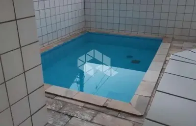 Apartamento a  venda em praia grande,  vila tupi, com 1 quarto e 1 vaga