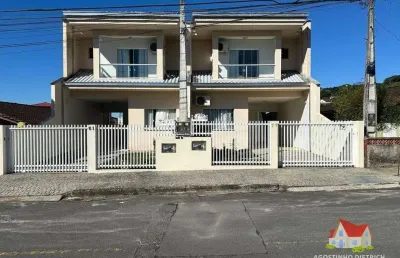 Sobrado geminado c/area de 112 m2 c/03 quartos c/suite + espaco aos fundos + 02 vagas de garagem no aventureiro!