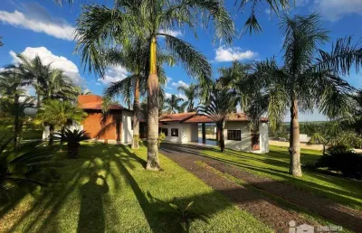 Casa com 3 dormitórios à venda, 326 m² por r$ 3.500.000,00 - condomínio costa do sol - rolândia/pr