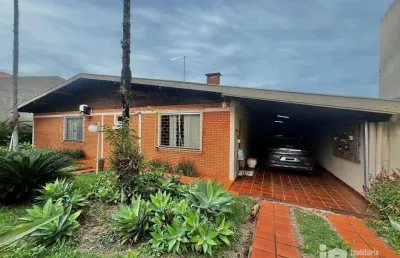 Casa com 3 dormitórios à venda, 293 m² por r$ 1.700.000 - centro - rolândia/pr