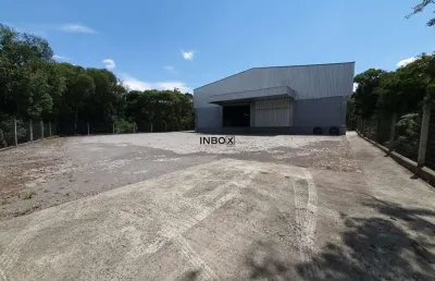 Inbox cia imobiliária aluga pavilhão com 3500m² com plataforma para carregamento ás margens da rodovia na cidade de garibaldi