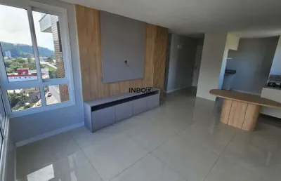 Inbox cia imobiliária vende apartamento semimobiliado com 02 dormitórios e 02 boxes no bairro borgo