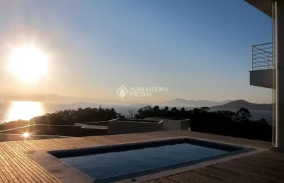 Casa em condomínio fechado com 3 quartos à venda na rodovia haroldo soares glavan, 4430, cacupé, florianópolis, 461 m2 por r$ 6.500.000