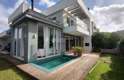Casa em condomínio fechado com 3 quartos à venda na rua gaivotas, 20, lagoa da conceição, florianópolis, 245 m2 por r$ 2.660.000