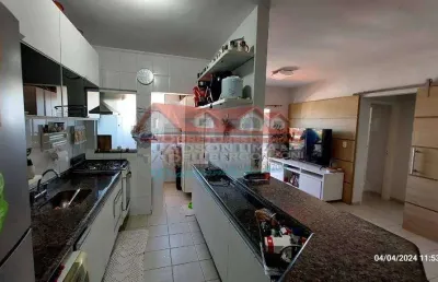 Apartamento de 2 quartos com suíte e vaga de garagem no centro de caraguatatuba-sp: imperdível oportunidade de investimento!
