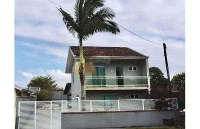 Sobrado em itapoá 153m² com piscina e porteira fechada, 250 metros da praia das palmeiras – sc