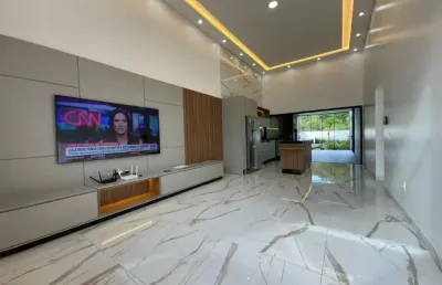 Linda casa com três dotmitórios sendo 1 suite, sala e cozinha em conceito aberto, área de serviço coberta,  amplo quintal e 2 vagas.