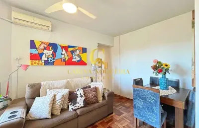 Apartamento 1 dormitório com elevador e vaga de garagem.