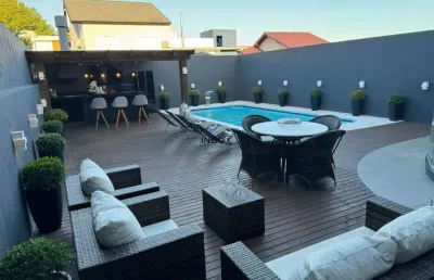Inbox cia imobiliaria vende ótima casa 100% mobiliada, em condomínio de alto padrão, na zona sul de porto alegre.