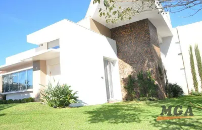 Sobrado com 3 dormitórios à venda, 398 m² por r$ 3.000.000,00 - condomínio villagio cataratas - foz do iguaçu/pr