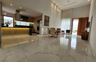 Casa linear com piscina e área gourmet em condomínio fechado