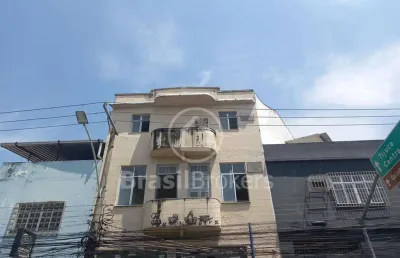 Prédio de 3 andares frente de rua colado na avenida brasil