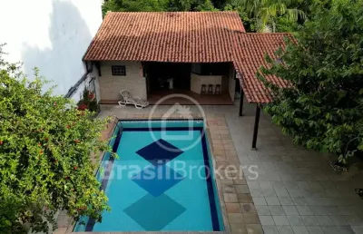 Maravilhosa casa duplex parte baixa do jardim guanabara com linda área de lazer piscina e churrasqueira