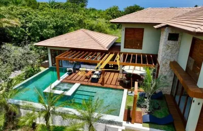 Casa extraordinária no condomínio praia bella em praia do forte. 6 suítes, 500m2 de área construída, a 700m da praia! finamente decorada e mobiliada!