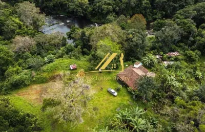 Fazenda de cacau no município de ilhéus, quase em itajuípe. 125 hectares. plantação de cacau e também de açaí.  o rio almada passa por dentro dela.