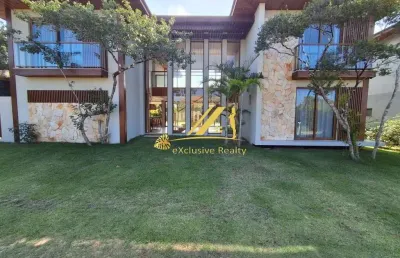 Casa em praia do forte finamente decorada e mobiliada. condomínio ilha dos pássaros. 360m2 de área construída, 4 suítes, jardim, piscina.