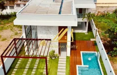 Oportunidade- casa de luxo mobiliada em guarajuba, a 200m da praia, no condomínio paraíso! 7 suítes, piscina com hidro e cascata. agende sua visita