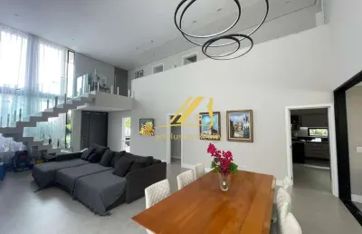 Casa moderna e sofisticada no alphaville 1. condomínio itaparica. 4 suítes, piscina, área gourmet. 400m2 de área construída.