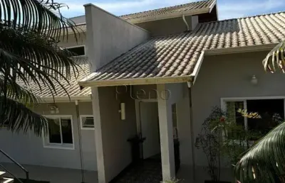 Casa à venda com 4 suítes no condomínio estância marambaia, vinhedo.