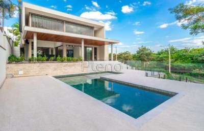 Casa à venda com 4 suítes no residencial jatibela, campinas.