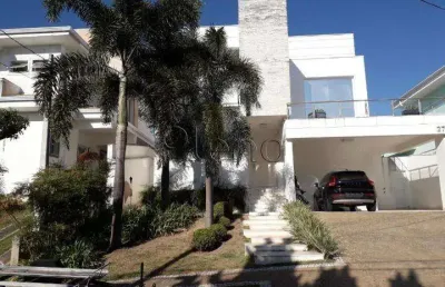 Sobrado à venda em valinhos, santa cruz, com 3 suítes, com 302 m², residencial terras do caribe