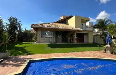 Sobrado à venda em campinas, loteamento alphaville campinas, com 4 suítes, com 430 m²