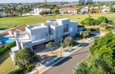 Sobrado à venda em campinas, loteamento alphaville campinas, com 4 suítes, com 690 m²