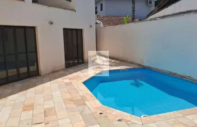 Casa em condomínio fechado com 3 quartos para alugar no Balneário Praia do Pernambuco, Guarujá 