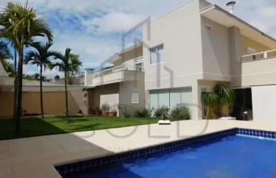 Sobrado à venda em campinas, loteamento alphaville campinas, com 4 suítes, com 410 m²