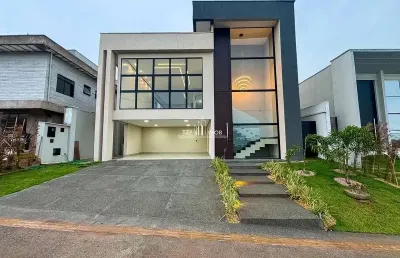 Casa subtérrea com 4 suítes plenas sendo uma master com closet.