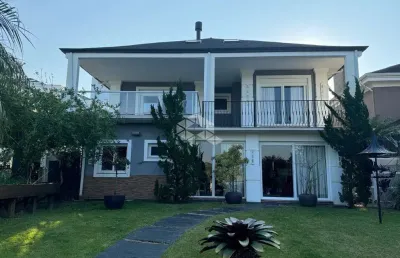 Casa em condomínio fechado com 3 quartos à venda na Avenida Juca Batista, 9000, Belém Novo, Porto Alegre