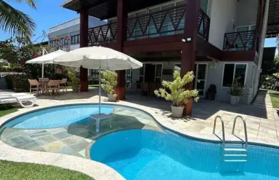 Casa de praia 287m² com 4 suítes, piscina, churrasqueira, 4 garagens, totalmente mobiliada, à venda