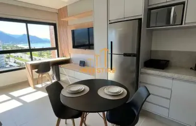 Studio mobiliado no innovate -vista lateral p/ praia do indaiá em caraguatatuba