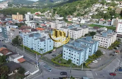 Apartamento à venda, no bairro universitário, biguaçu-sc, com 2 quartos, sendo , com 1 vaga