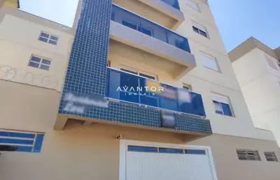 Apartamento 02  dormitórios com suíte, vaga de garagem, sacada e churrasqueira.