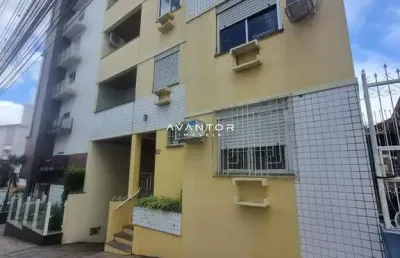Apartamento dois dormitórios, sacada, churrasqueira, cozinha mobiliada
