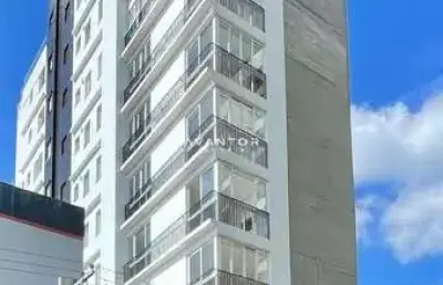 Apartamento, 2 dormitórios, 1 suíte, 2 banheiros, 2 vagas, centro